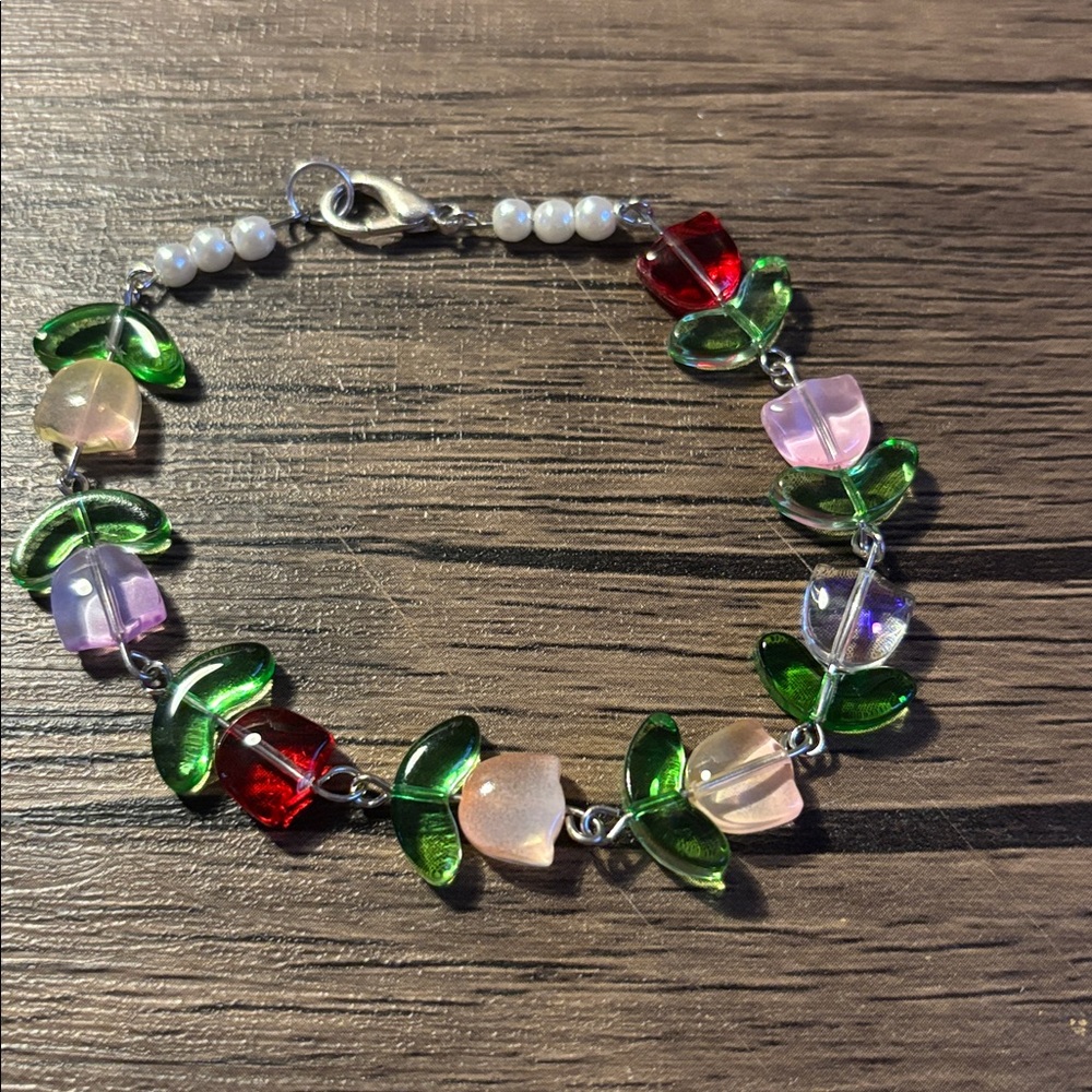Colorful Beaded Bracelet with Green, Red, and Pink Accents